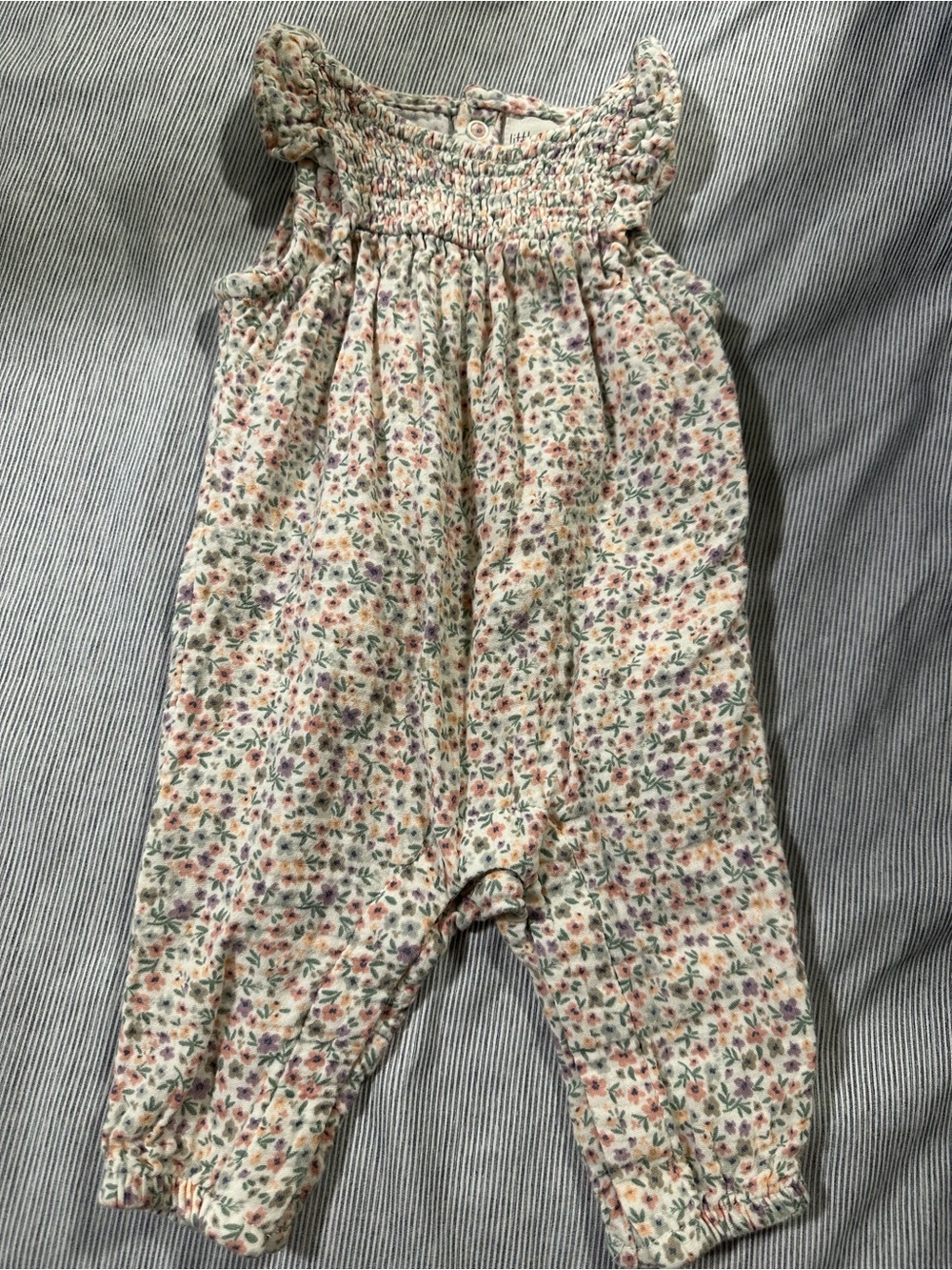 Carter's Floral Smocked Romper in Cream with Pink & Purple Accents